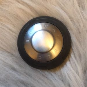 Becca mini highlighter in shade moonstone